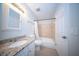 Bathroom with a tiled shower and granite countertop at 2920 Newport Pl, North Charleston, SC 29420