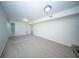 Empty bedroom shows neutral walls, carpet, and an ensuite bathroom at 2920 Newport Pl, North Charleston, SC 29420