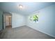 A cozy bedroom features neutral carpet, fresh paint, and a bright window at 2920 Newport Pl, North Charleston, SC 29420
