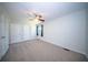 A carpeted bedroom with a ceiling fan and a bright window offering a serene space at 2920 Newport Pl, North Charleston, SC 29420