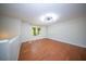 Bright bedroom with hardwood floors, a modern light fixture, and a window view at 2920 Newport Pl, North Charleston, SC 29420