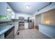 Updated kitchen with stainless steel appliances, stylish backsplash, and bright lighting at 2920 Newport Pl, North Charleston, SC 29420