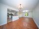 Hardwood floors flow through the open living spaces, connecting to updated kitchen at 2920 Newport Pl, North Charleston, SC 29420