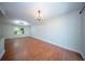 Bright living room with hardwood floors, modern light fixtures, and open concept design at 2920 Newport Pl, North Charleston, SC 29420
