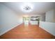 Bright living room features hardwood floors, modern light fixture, and open concept design at 2920 Newport Pl, North Charleston, SC 29420