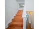 An interior shot of the home's wood stairs leading to the second floor at 2920 Newport Pl, North Charleston, SC 29420