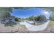 A street view of home with mature trees, landscaping, driveway, and a serene neighborhood setting at 2920 Newport Pl, North Charleston, SC 29420