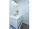 Bathroom boasts a marble vanity, modern fixtures, and open shelving below the sink at 3 Lord Ashley Dr, Charleston, SC 29407