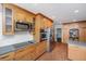 Kitchen with stainless appliances, granite counters, custom cabinetry, and open layout for easy access at 3 Lord Ashley Dr, Charleston, SC 29407