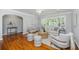 Bright and airy living room features hardwood floors, neutral tones, and stylish furnishings at 3 Lord Ashley Dr, Charleston, SC 29407