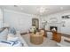 Cozy living room with a fireplace, built-in bookshelves, and comfortable seating at 3 Lord Ashley Dr, Charleston, SC 29407