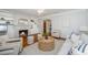 Comfortable living room with a fireplace, built-in shelves, and hardwood floors at 3 Lord Ashley Dr, Charleston, SC 29407