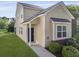 Well-maintained two-story home with a welcoming entrance and lovely landscaping at 344 Flyway Rd, Goose Creek, SC 29445