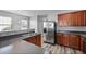 Well-equipped kitchen with stainless steel fridge and wood cabinetry at 344 Flyway Rd, Goose Creek, SC 29445