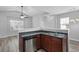 Modern kitchen with stainless steel dishwasher, grey countertops, and wood-look flooring at 344 Flyway Rd, Goose Creek, SC 29445