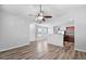 Open-concept living space featuring wood-look flooring and neutral paint throughout at 344 Flyway Rd, Goose Creek, SC 29445