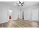 Spacious main bedroom with wood floors, ensuite bathroom, and large closet for ample storage at 344 Flyway Rd, Goose Creek, SC 29445