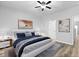 Stylish main bedroom with modern furnishings, tasteful decor, and wood flooring throughout at 344 Flyway Rd, Goose Creek, SC 29445