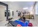 Spacious basement featuring an exercise area and a living space with neutral tones at 3567 Somerset Hills Ct, Mount Pleasant, SC 29466