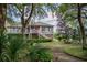 Well-maintained house showcasing a spacious backyard with mature trees, offering a great space for outdoor activities at 3567 Somerset Hills Ct, Mount Pleasant, SC 29466
