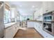 Bright kitchen with granite countertops, stainless steel appliances, and hardwood floors at 3567 Somerset Hills Ct, Mount Pleasant, SC 29466