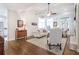 Comfortable living room featuring hardwood floors, lots of natural light, and a neutral color palette at 3567 Somerset Hills Ct, Mount Pleasant, SC 29466