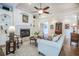 Inviting living room with fireplace, ceiling fan, and hardwood floors at 3567 Somerset Hills Ct, Mount Pleasant, SC 29466