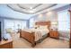 Spacious main bedroom with sitting area, natural light, and tray ceiling at 3567 Somerset Hills Ct, Mount Pleasant, SC 29466