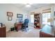 Dedicated office space with built-in bookshelves and natural light at 3567 Somerset Hills Ct, Mount Pleasant, SC 29466
