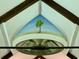 Unique ceiling feature with a painted tree scene and geometric design elements at 41 Pitt St, Charleston, SC 29401
