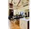 Dining room with an open floor plan to the kitchen and living room, hardwood floors, and high ceilings at 41 Pitt St, Charleston, SC 29401
