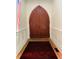 Inviting entryway with an oversized paneled door and decorative rug at 41 Pitt St, Charleston, SC 29401
