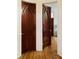 View of wooden interior doors with an arched design and brass hardware at 41 Pitt St, Charleston, SC 29401