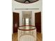 Stairway with curved railing in a hallway with interior doors and hardwood floors at 41 Pitt St, Charleston, SC 29401