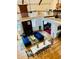 Aerial view of an open-concept living space with high ceilings, hardwood floors, and a second story at 41 Pitt St, Charleston, SC 29401