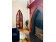 Cozy living area with an elegant fireplace and comfy blue seating at 41 Pitt St, Charleston, SC 29401