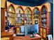 Office features custom built-in shelving with arched woodworking at 41 Pitt St, Charleston, SC 29401