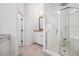 Bright bathroom features a glass enclosed shower with a built in bench at 4386 Park Island Rd, Hollywood, SC 29449