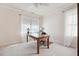 Bright bedroom with carpeted floor features large windows and a ceiling fan at 4386 Park Island Rd, Hollywood, SC 29449