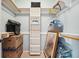 Walk in closet with white shelves and rod provides ample storage space at 4386 Park Island Rd, Hollywood, SC 29449