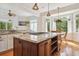Open concept kitchen with granite countertops, central island and stainless steel appliances at 4386 Park Island Rd, Hollywood, SC 29449