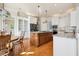 Bright kitchen featuring stainless steel appliances, granite counters and a central island at 4386 Park Island Rd, Hollywood, SC 29449