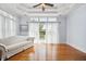 Bright living room with hardwood floors, large windows, and a comfortable sofa at 4386 Park Island Rd, Hollywood, SC 29449