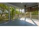 Inviting screened porch providing a peaceful retreat with scenic landscape views at 4386 Park Island Rd, Hollywood, SC 29449