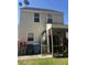 Exterior backyard featuring covered patio, trashcans, fence, and siding at 4816 Cane Pole Ln, Summerville, SC 29485