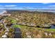 Panoramic aerial view of property located near golf course, waterways, and local village at 4947 Green Dolphin Way, Kiawah Island, SC 29455