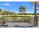 Relaxing balcony view overlooking a lush green golf course and tranquil pond at 4947 Green Dolphin Way, Kiawah Island, SC 29455