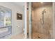 Clean and well-lit bathroom showcasing a glass-enclosed shower and neutral decor at 4947 Green Dolphin Way, Kiawah Island, SC 29455