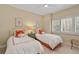 Charming bedroom featuring two twin beds with bright decor, perfect for guests at 4947 Green Dolphin Way, Kiawah Island, SC 29455