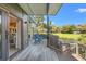 Relaxing outdoor deck with comfortable seating overlooking the pond and golf course at 4947 Green Dolphin Way, Kiawah Island, SC 29455